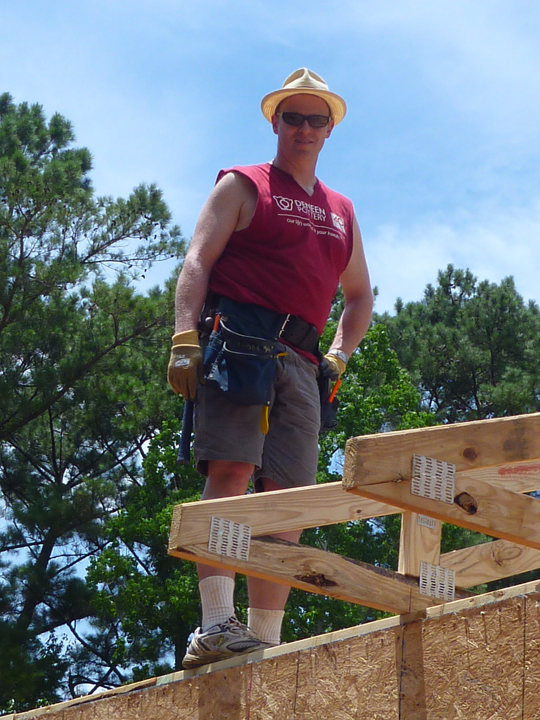 Up on the roof installing trusses