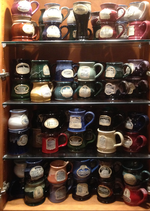 Cupboard full of mugs 