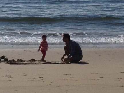 Eloise building sand castle 