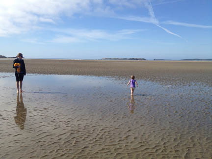 Eloise walking on the beach 