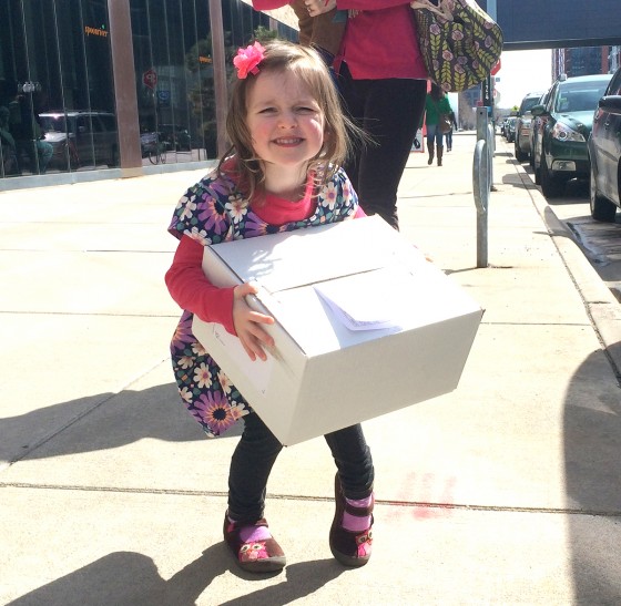 elosie carrying a box 