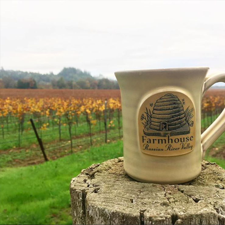 farmhouse inn mug in the field