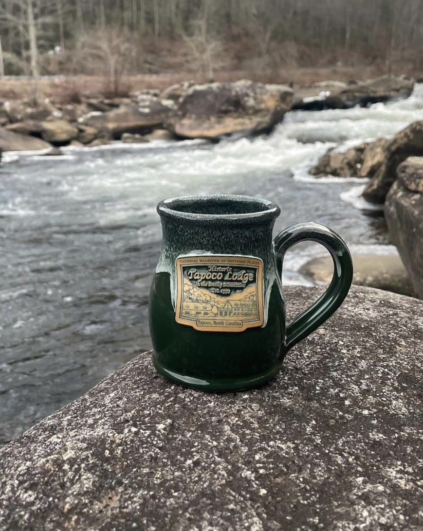 mug on a river bank 