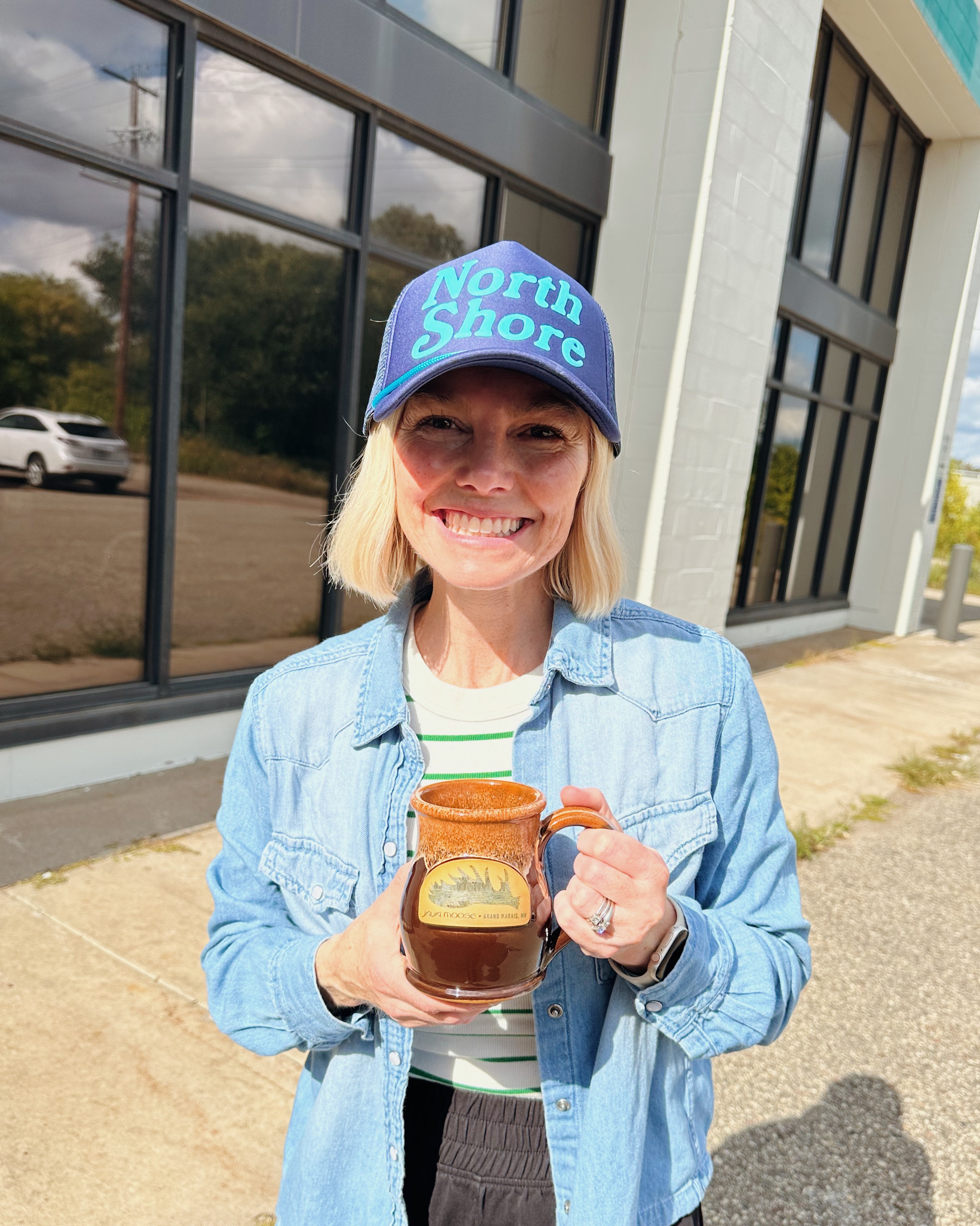 photo of sarah holding the mug 
